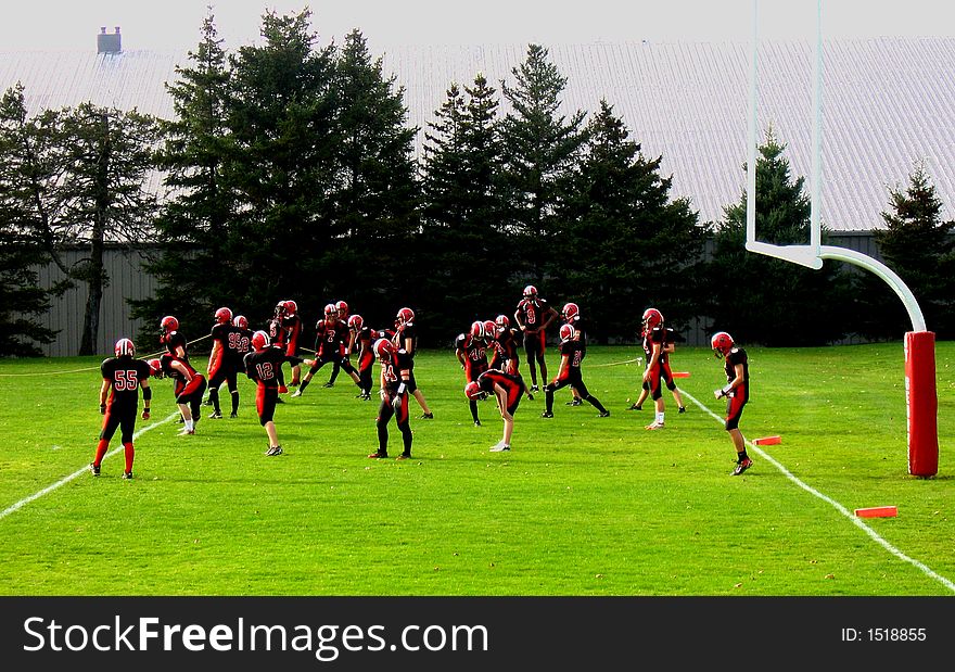 Athlets prepare for the football game. Athlets prepare for the football game