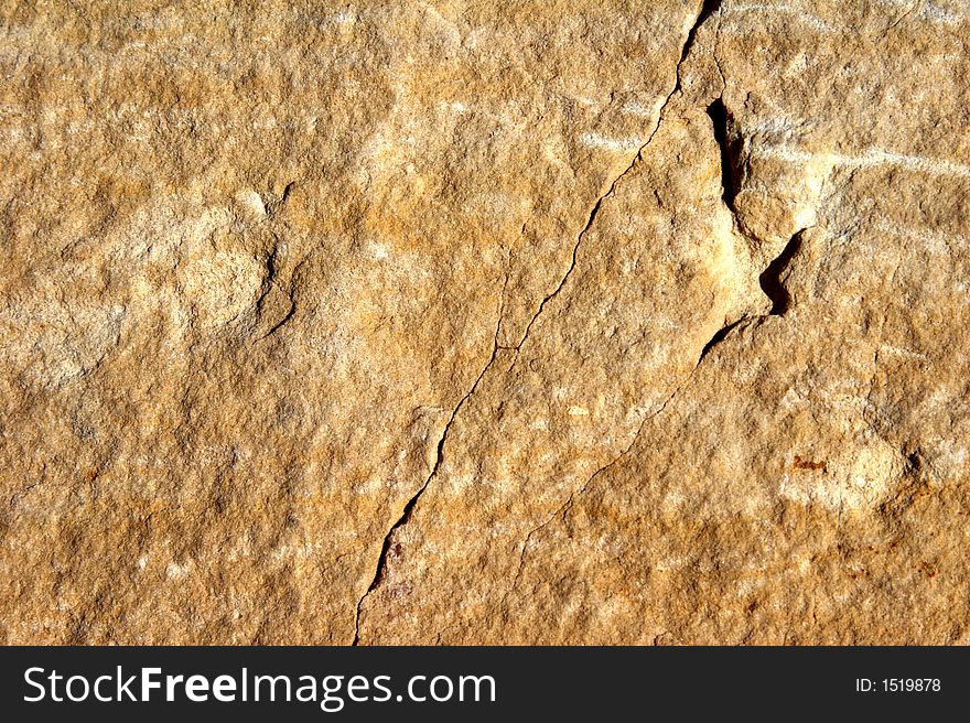 Reddish face of stone - different structures - landscape format