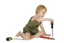 Girl With A Screwdriver Pliers And A Tape Royalty Free Stock Image Girl With A Screwdriver Pliers And A Tape Royalty Free Stock Image