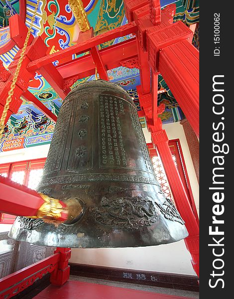 A old black bell in chinese temple, thailand.