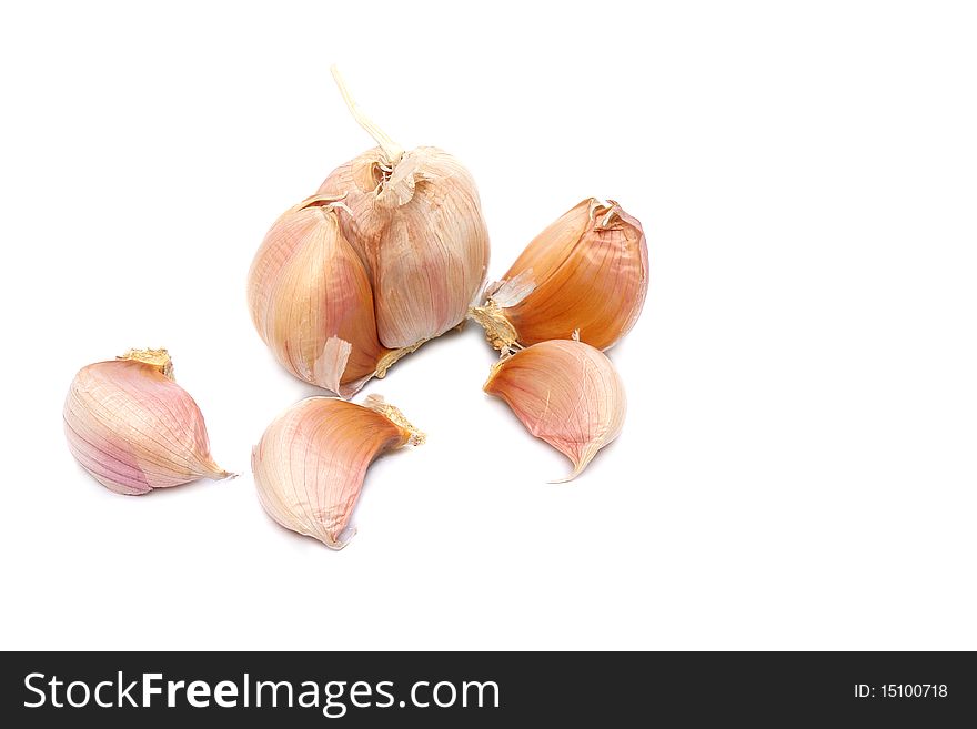 Healthy white vegetable garlic isolated white on background