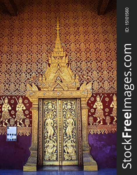 Beautiful wooden carving door that decore by carving wood in laos temple. Beautiful wooden carving door that decore by carving wood in laos temple