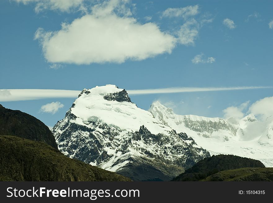 Peak of the mountain covered with snow. Peak of the mountain covered with snow