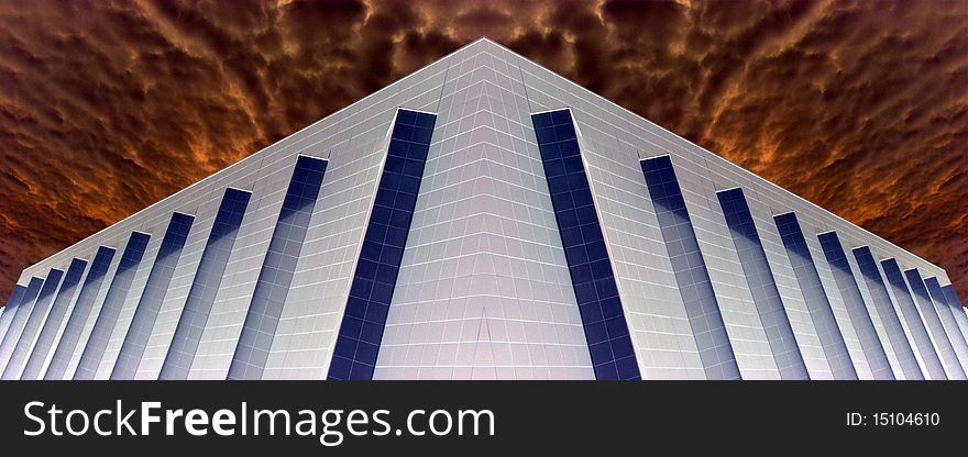 Building corner with dramatic red sky. Building corner with dramatic red sky