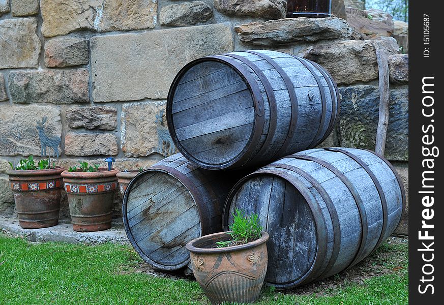 Old whiskey barrels stacked up. Old whiskey barrels stacked up