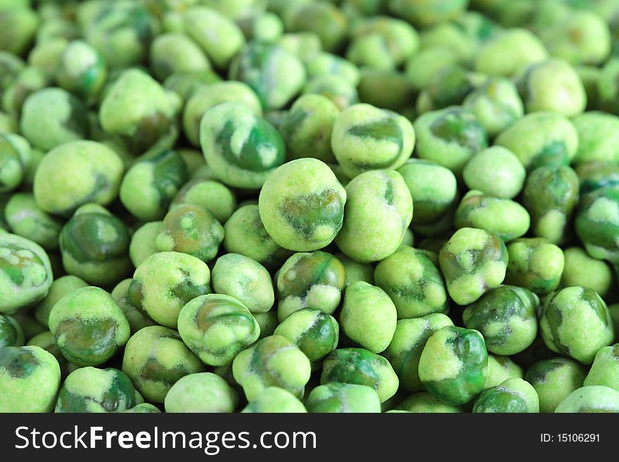 Close up of a pile of coated green peas. Close up of a pile of coated green peas.