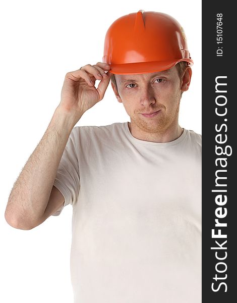 Studio portrait of a happy handyman in orange helmet