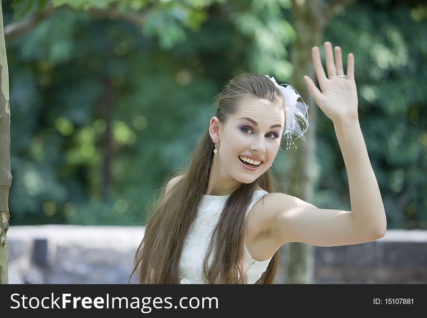 Young Bride Waving With Hand