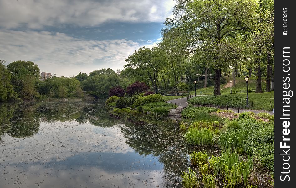 Spring at the pond in Central Park, New York City with Gapstow bridge in the background. Spring at the pond in Central Park, New York City with Gapstow bridge in the background