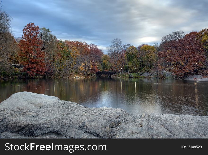 Autumn in Central Park with view from the lake in the early morning