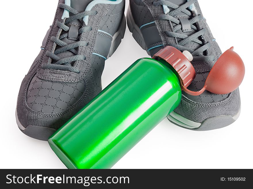 Sports footwear, thermos for water isolated on white background. Sports footwear, thermos for water isolated on white background.