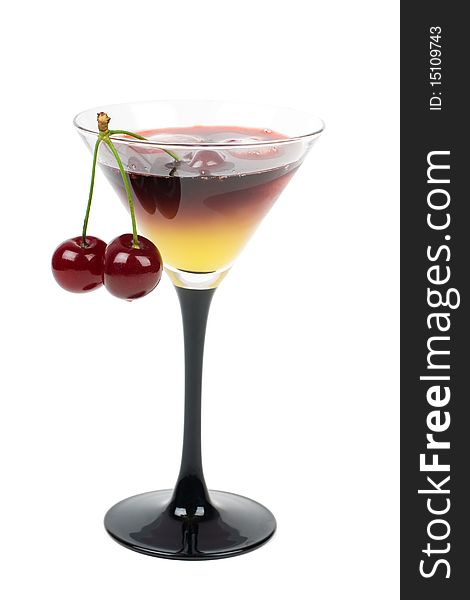 Cocktail with ice and fresh cherries, it is isolated on a white background.