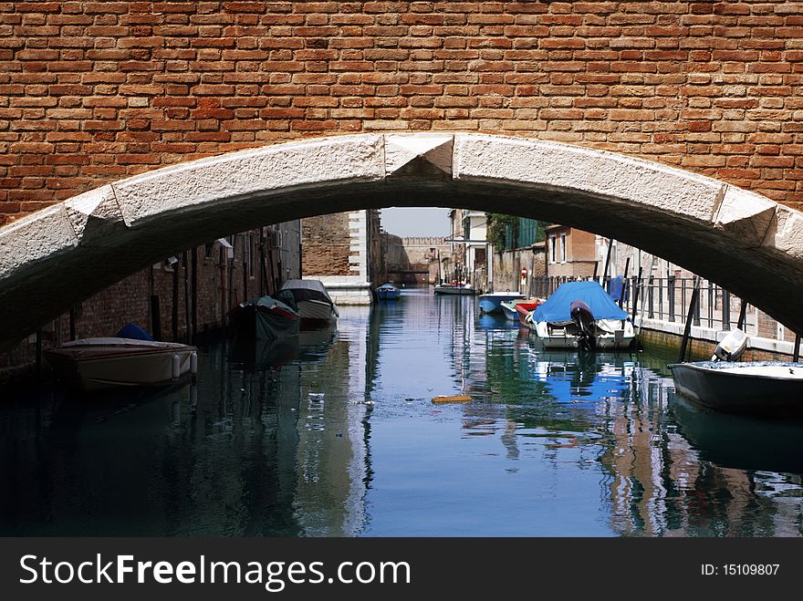 Arch above water in Venice