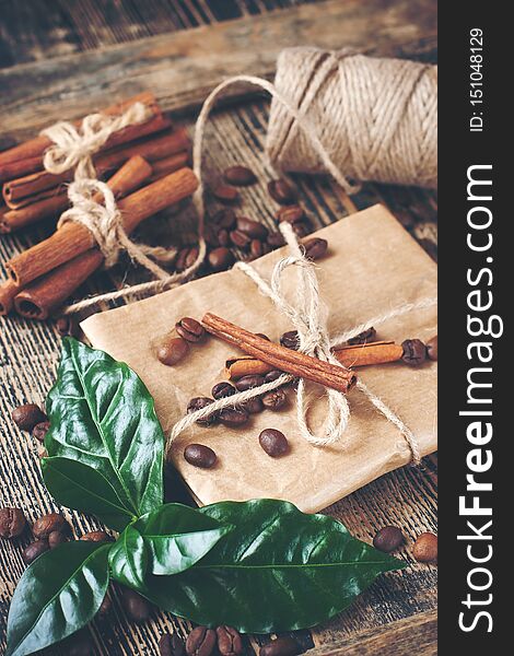 Roasted coffee beans on  old wooden  background