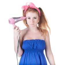 Red-haired Girl With The Hair Dryer. Royalty Free Stock Photography