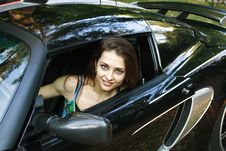 The Beautiful Girl Is Sitting In The Car Stock Photo The Beautiful Girl Is Sitting In The Car Stock Photo
