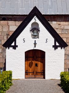 Gable Wiht Door And Church Bell Stock Image