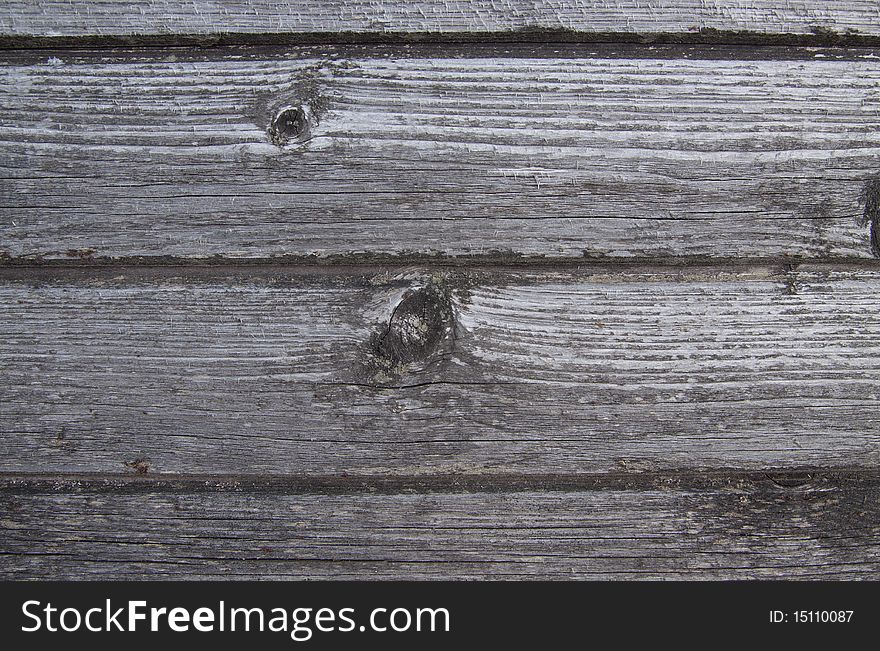 Very old boards with splinters are photographed as a structure
