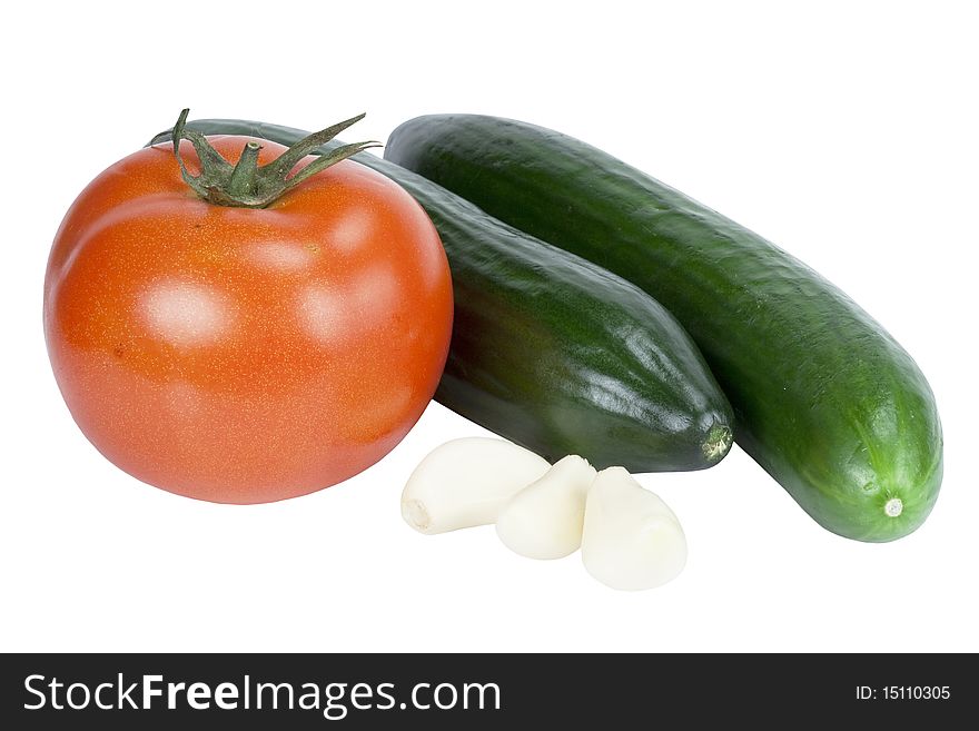 Tomato, cucumber and garlic vegetables on white background