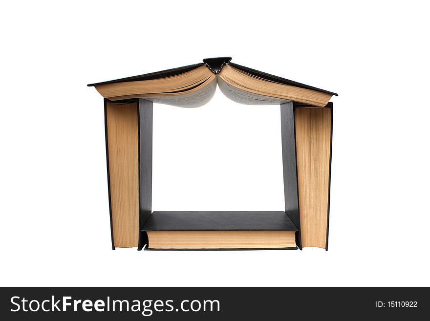The house consisting of books isolated on a white background