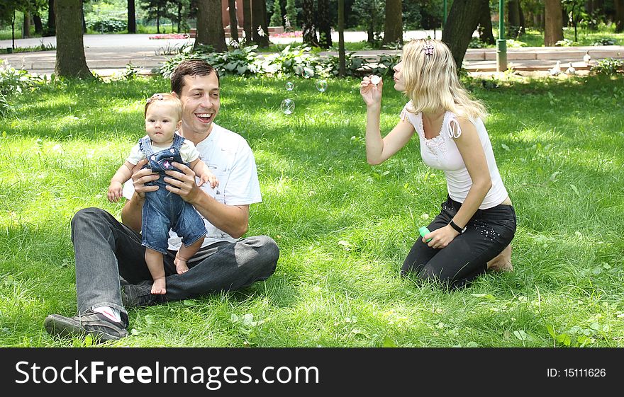 The family has a rest on a nature