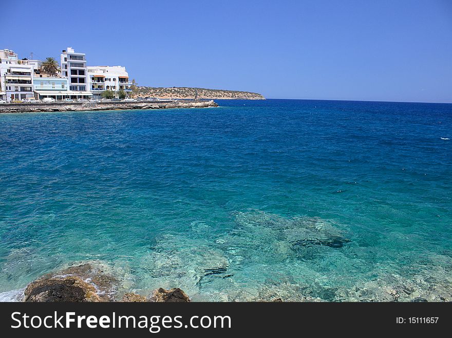 Houses near the sea in sunny day