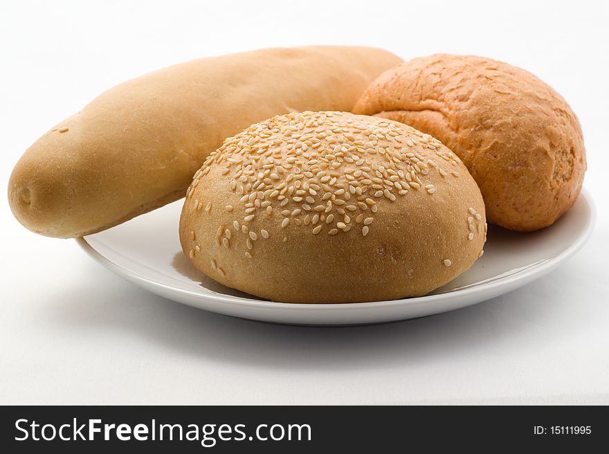 Wheat bread on the white plate