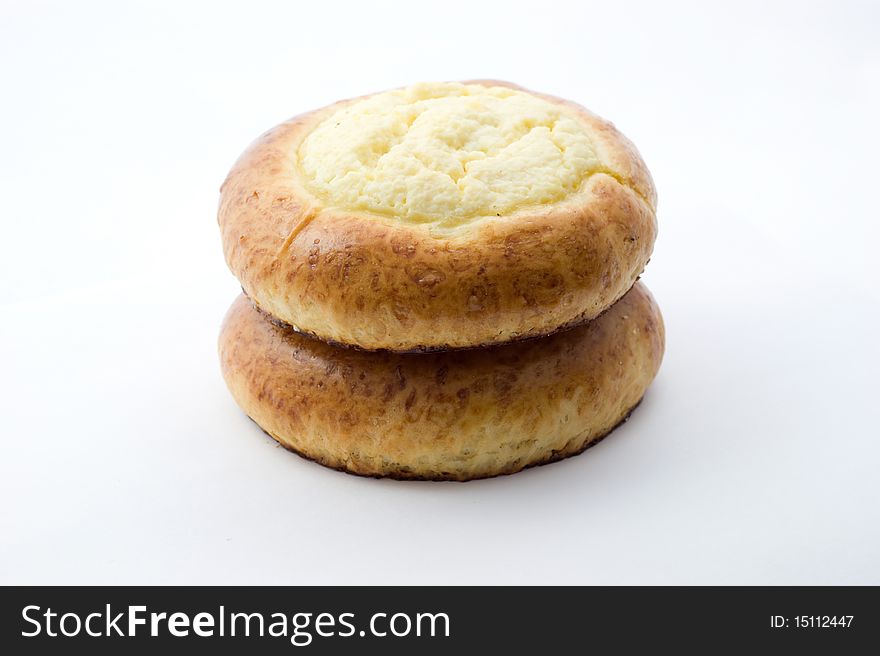 Sweet buns with cheese on white background