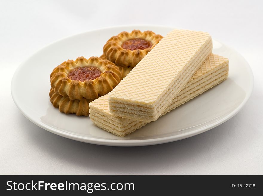 Sweet cookies with fruit butter and waffles. Sweet cookies with fruit butter and waffles