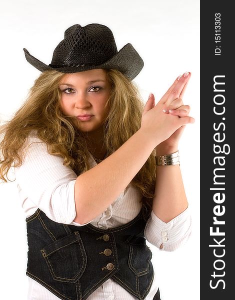 Beautiful western girl with fingers in the shape of gun