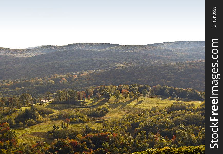 Landscape on the edge of fall with rolling hills. Landscape on the edge of fall with rolling hills