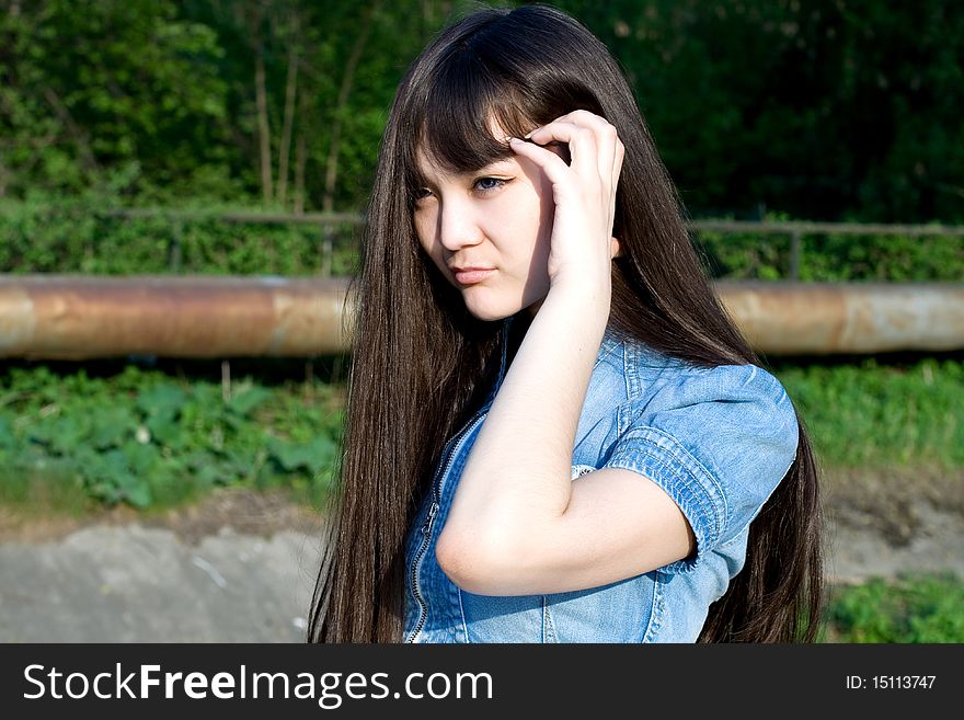 Girl walking in city  park. Girl walking in city  park