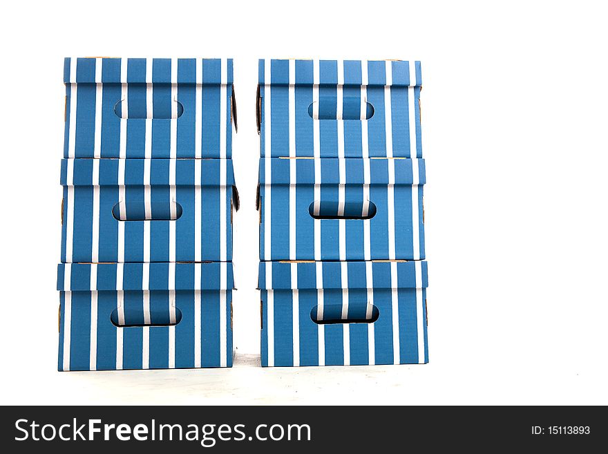 Two Piles of Colourful Cardboard Boxes on White Isolated Background. Two Piles of Colourful Cardboard Boxes on White Isolated Background