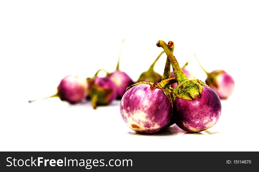Group of small Egg-plants. Aubergine. Isolated over white.