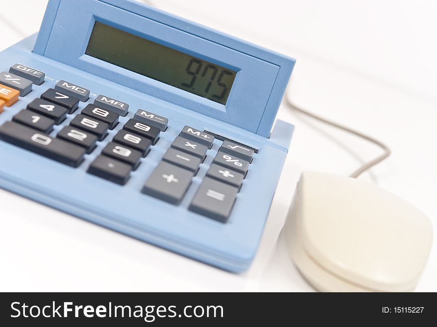 Calculator with California tax displayed and mouse for online financing. Calculator with California tax displayed and mouse for online financing