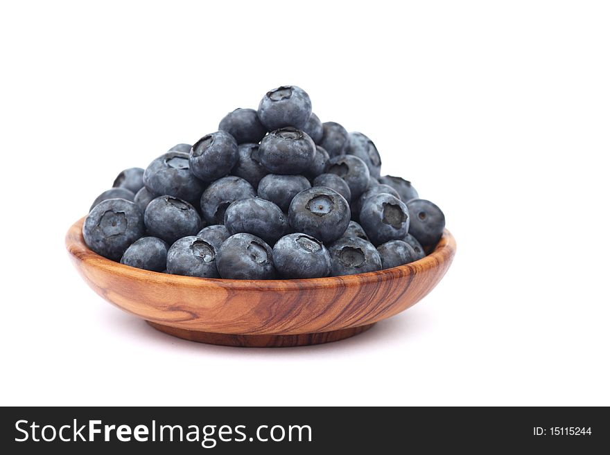 Several blueberries on white background