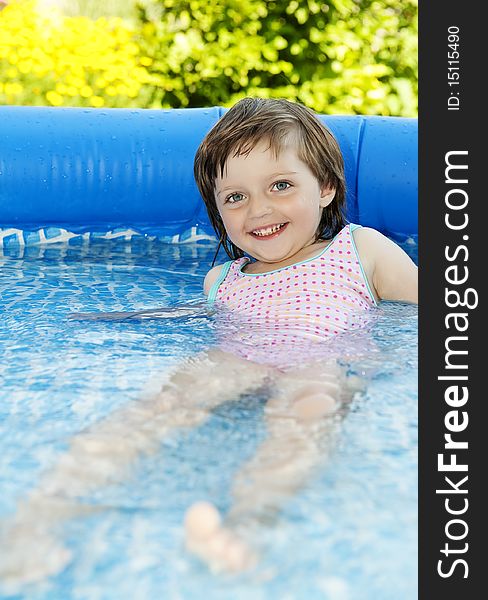 Little Girl Swimming In Basin