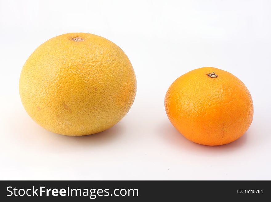 Isolated orange and mandarin in white background.