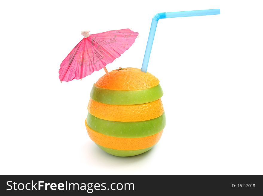 Fruit slice cocktail with a party umbrella and straw. Fruit slice cocktail with a party umbrella and straw