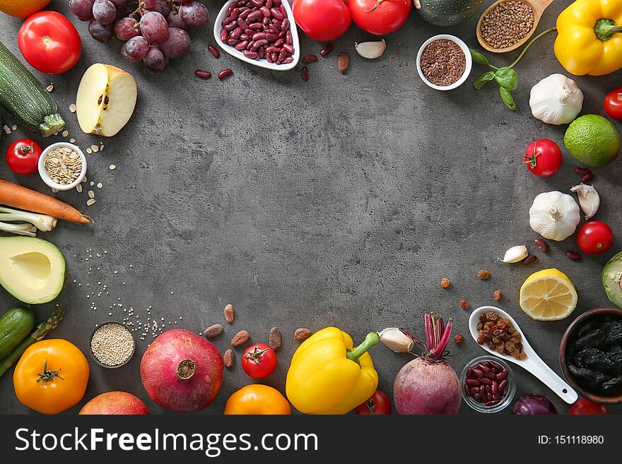 Composition with various healthy products on grey background