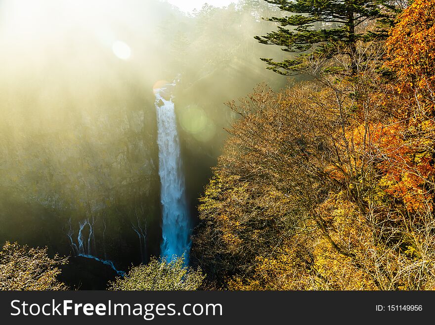 Beautiful autumn landscape of waterfall and sun beams, Kegon, Nikko, Japan, nature background