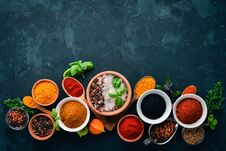 A Set Of Spices And Herbs On A Stone Table. Indian Traditional Spices. Stock Photo A Set Of Spices And Herbs On A Stone Table. Indian Traditional Spices. Stock Photo