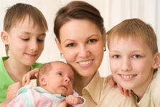 Young Mother With Three Children Royalty Free Stock Photography