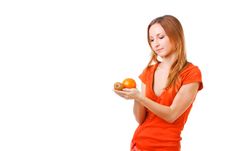 Young Pretty Girl In Dress With Orange And Kiwi Stock Images Young Pretty Girl In Dress With Orange And Kiwi Stock Images