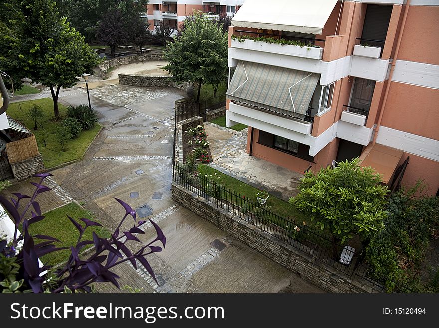 New homes in a building with a green garden