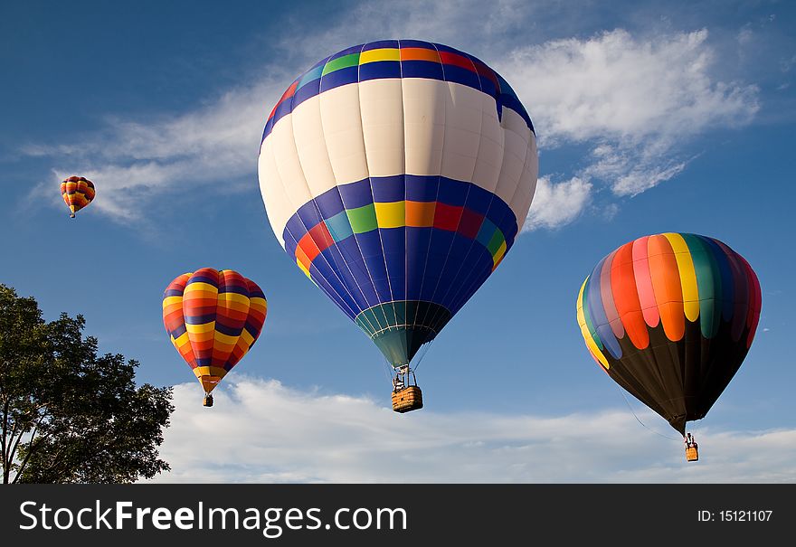 Hot air balloons ascending above the Colorado Springs Balloon Classic. Hot air balloons ascending above the Colorado Springs Balloon Classic