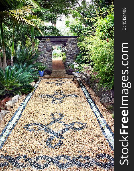 Patterned garden path with stone inlay. Patterned garden path with stone inlay