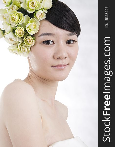 Beautiful bride with perfect natural makeup,flowers on head,smiling