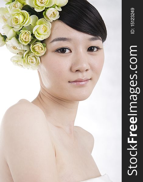 Beautiful bride with perfect natural makeup,flowers on head,smiling