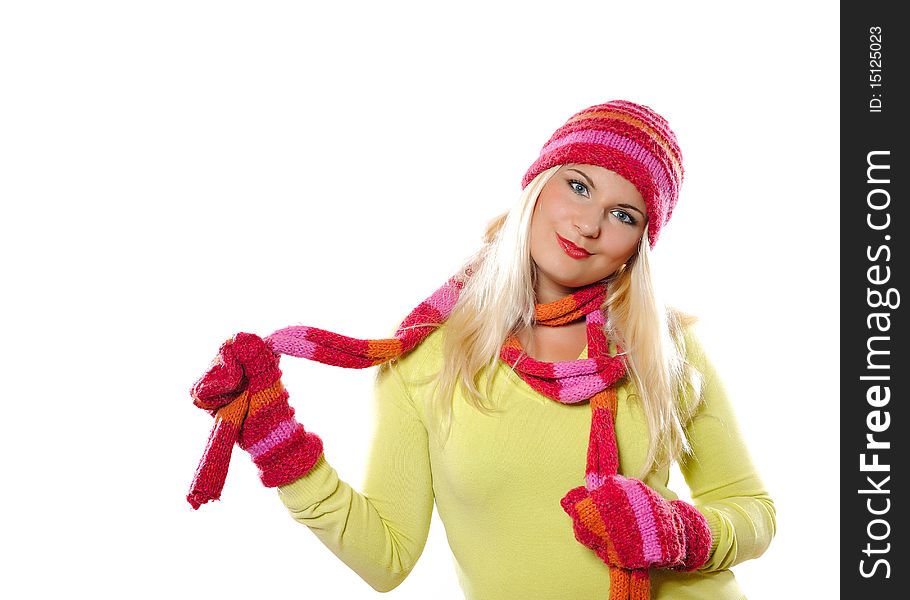 Seasonal portrait of pretty funny woman in hat and gloves smiling